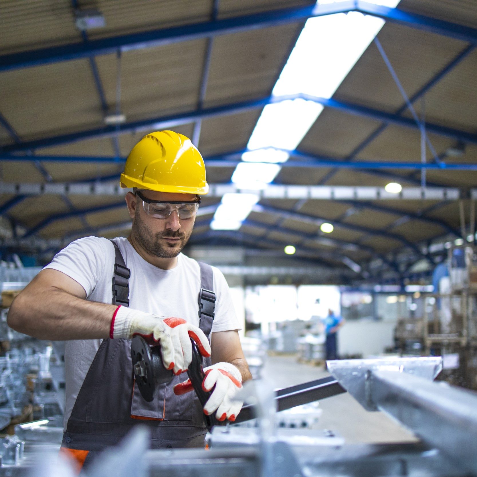 factory-worker-working-industrial-production-hall factory-worker-working-industrial-production-hall